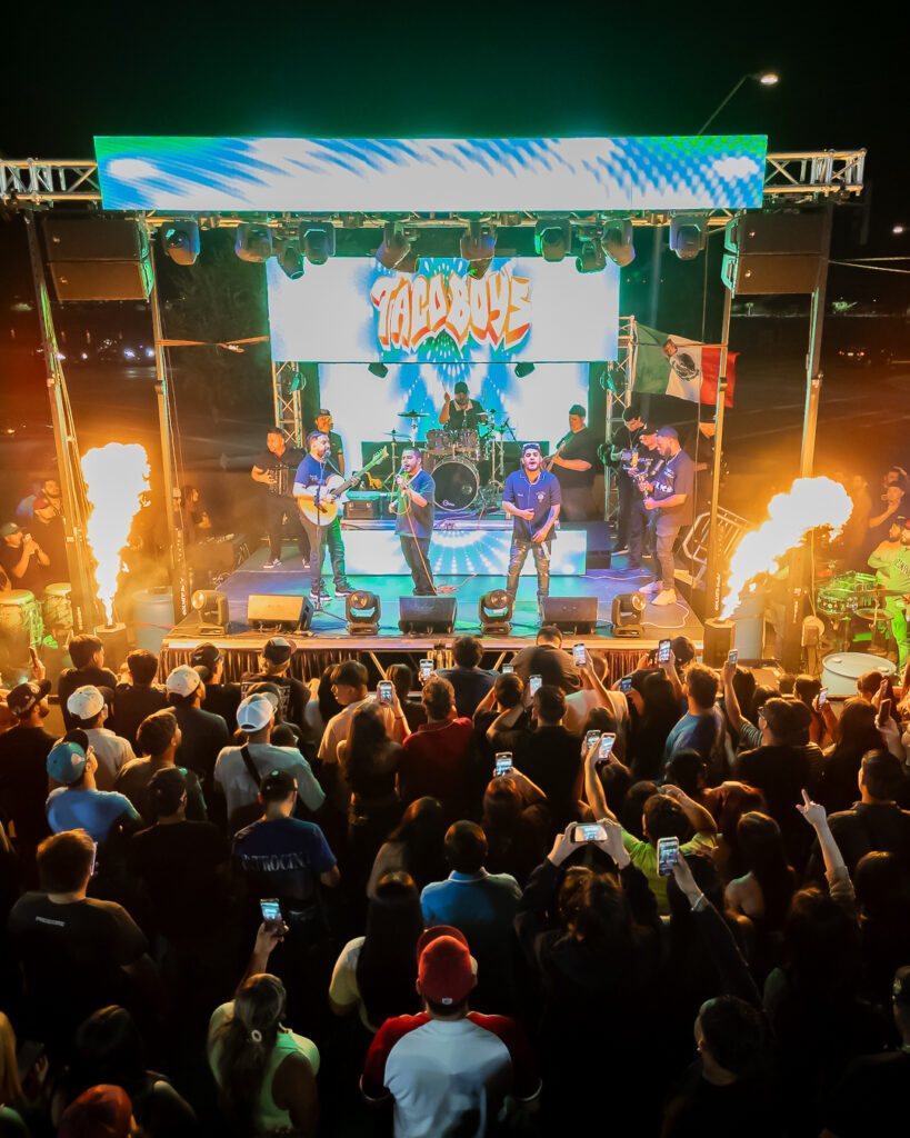 Custom LED panels built into DJ booth with synced lighting effects