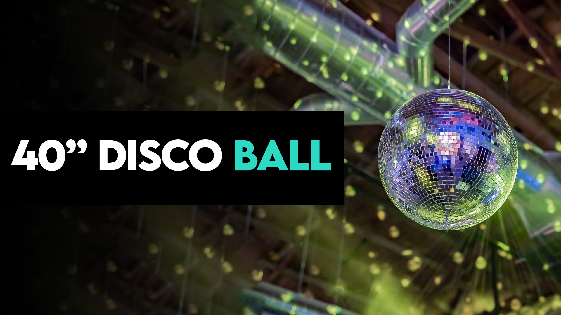 Massive 40-inch disco ball hanging above a dance floor reflecting light beams across a packed wedding or corporate event venue.