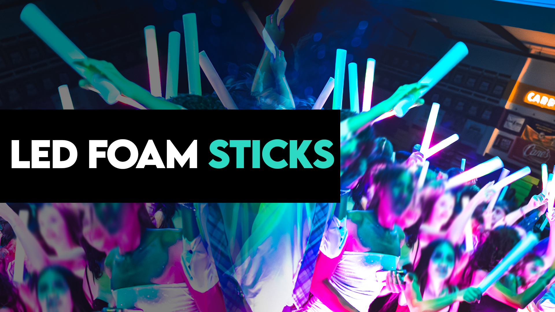 LED foam sticks lighting up a dance floor as guests wave glowing party lights in sync with the music at a wedding or corporate event.
