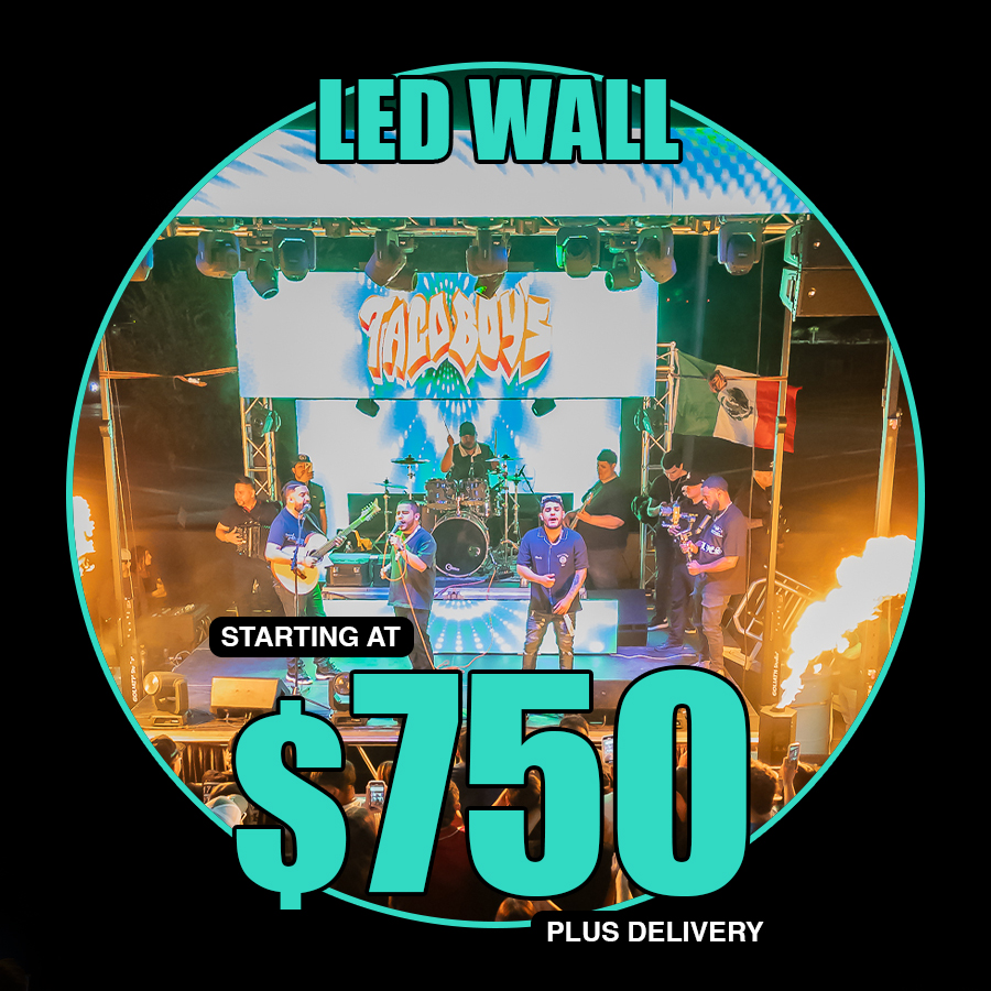 Festival stage with LED pillars and backdrop displaying animations